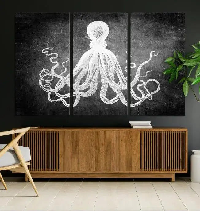 The Black White Octopus Wall Art Canvas Print is a captivating triptych featuring a white octopus against a dark background. Printed on museum-quality canvases, each piece boasts a UV-protective coating to maintain its vibrant elegance in any room.