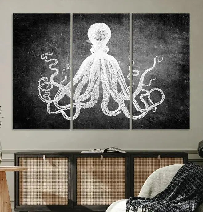 The Black White Octopus Wall Art Canvas Print is a captivating triptych featuring a white octopus against a dark background. Printed on museum-quality canvases, each piece boasts a UV-protective coating to maintain its vibrant elegance in any room.