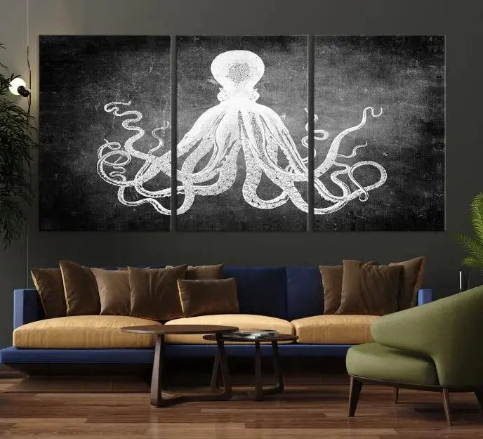 The Black White Octopus Wall Art Canvas Print is a captivating triptych featuring a white octopus against a dark background. Printed on museum-quality canvases, each piece boasts a UV-protective coating to maintain its vibrant elegance in any room.