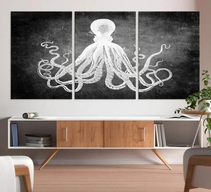 The Black White Octopus Wall Art Canvas Print is a captivating triptych featuring a white octopus against a dark background. Printed on museum-quality canvases, each piece boasts a UV-protective coating to maintain its vibrant elegance in any room.