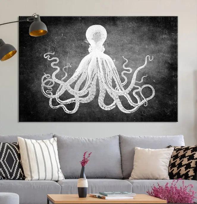 The Black White Octopus Wall Art Canvas Print is a captivating triptych featuring a white octopus against a dark background. Printed on museum-quality canvases, each piece boasts a UV-protective coating to maintain its vibrant elegance in any room.