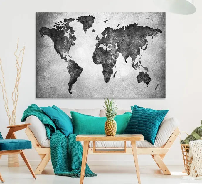 A Black and Gray World Map Canvas Wall Art Print, created on museum-quality canvas with UV-protective coating, hangs prominently.