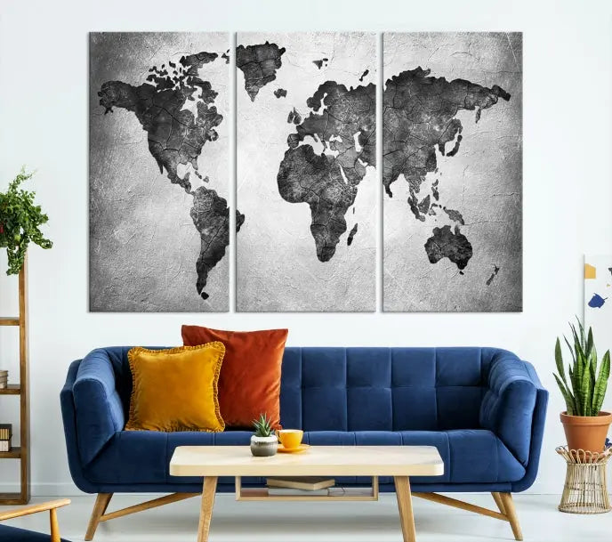 A Black and Gray World Map Canvas Wall Art Print, created on museum-quality canvas with UV-protective coating, hangs prominently.