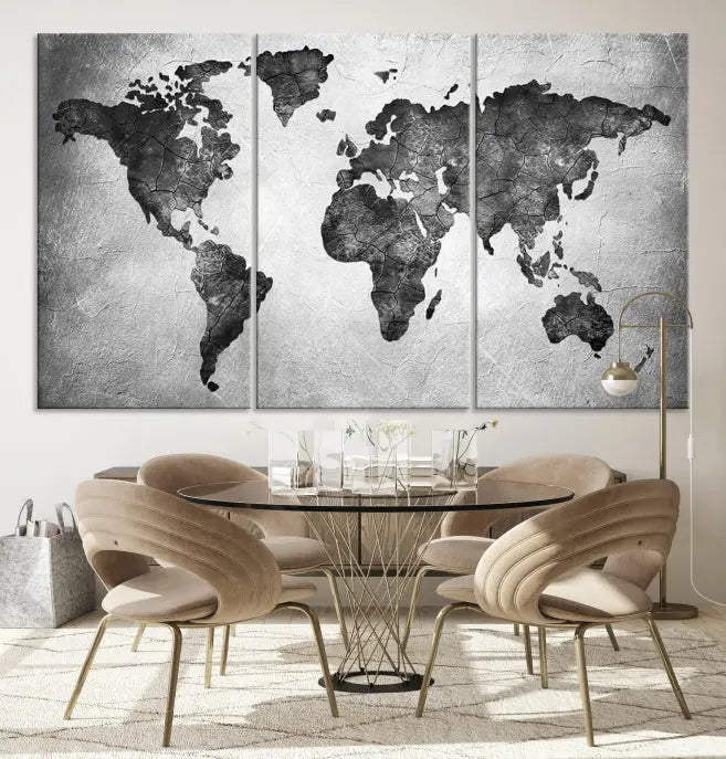 A Black and Gray World Map Canvas Wall Art Print, created on museum-quality canvas with UV-protective coating, hangs prominently.