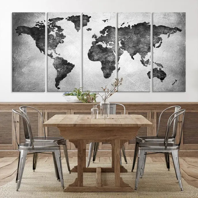 A Black and Gray World Map Canvas Wall Art Print, created on museum-quality canvas with UV-protective coating, hangs prominently.