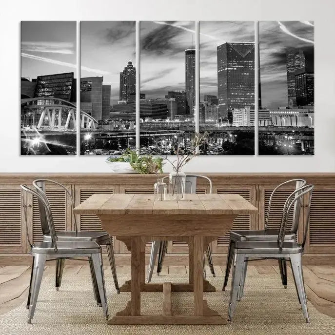 A modern living room featuring the Black and White Atlanta Wall Art Canvas Print as a triptych, displayed on museum-quality canvas and ready to hang.