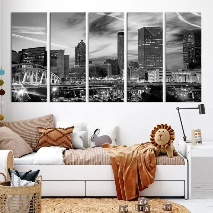 A modern living room featuring the Black and White Atlanta Wall Art Canvas Print as a triptych, displayed on museum-quality canvas and ready to hang.