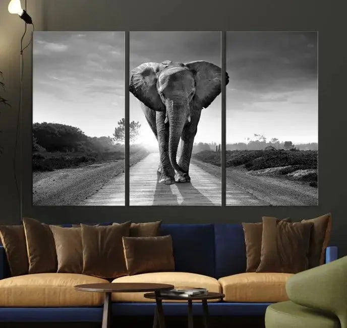 Black and White Elephant Wall Art Canvas Print is displayed as a triptych on museum-quality canvases, elegantly showcased on a dark wall. Each piece is ready to hang and features a durable UV-protective coating.