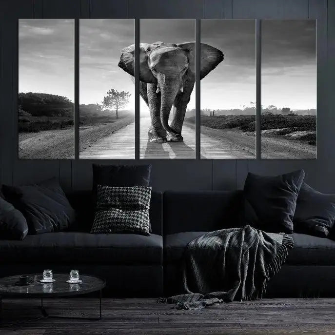 Black and White Elephant Wall Art Canvas Print is displayed as a triptych on museum-quality canvases, elegantly showcased on a dark wall. Each piece is ready to hang and features a durable UV-protective coating.