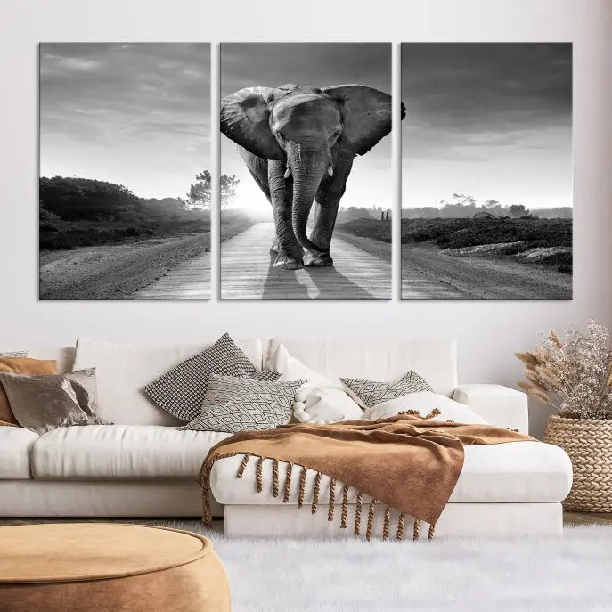 Black and White Elephant Wall Art Canvas Print is displayed as a triptych on museum-quality canvases, elegantly showcased on a dark wall. Each piece is ready to hang and features a durable UV-protective coating.