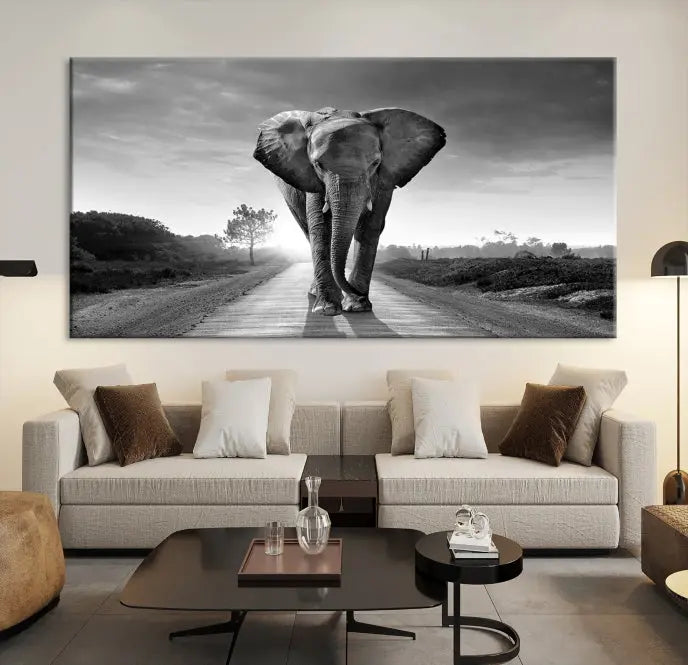 Black and White Elephant Wall Art Canvas Print is displayed as a triptych on museum-quality canvases, elegantly showcased on a dark wall. Each piece is ready to hang and features a durable UV-protective coating.