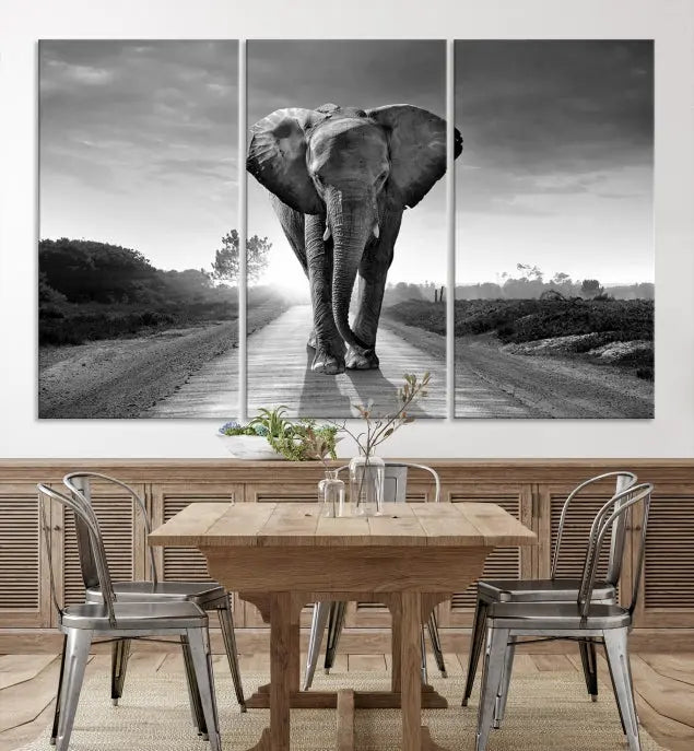 Black and White Elephant Wall Art Canvas Print is displayed as a triptych on museum-quality canvases, elegantly showcased on a dark wall. Each piece is ready to hang and features a durable UV-protective coating.