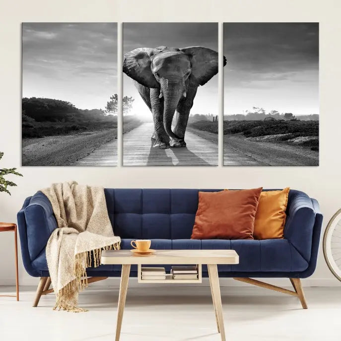 Black and White Elephant Wall Art Canvas Print is displayed as a triptych on museum-quality canvases, elegantly showcased on a dark wall. Each piece is ready to hang and features a durable UV-protective coating.