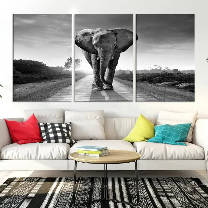 Black and White Elephant Wall Art Canvas Print is displayed as a triptych on museum-quality canvases, elegantly showcased on a dark wall. Each piece is ready to hang and features a durable UV-protective coating.