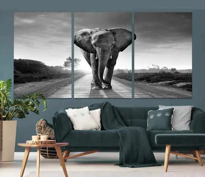 Black and White Elephant Wall Art Canvas Print is displayed as a triptych on museum-quality canvases, elegantly showcased on a dark wall. Each piece is ready to hang and features a durable UV-protective coating.