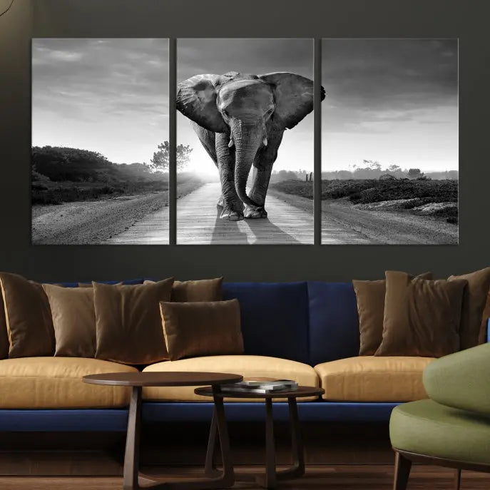 Black and White Elephant Wall Art Canvas Print is displayed as a triptych on museum-quality canvases, elegantly showcased on a dark wall. Each piece is ready to hang and features a durable UV-protective coating.