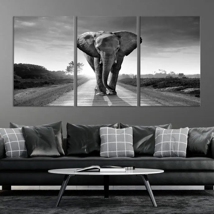 Black and White Elephant Wall Art Canvas Print is displayed as a triptych on museum-quality canvases, elegantly showcased on a dark wall. Each piece is ready to hang and features a durable UV-protective coating.