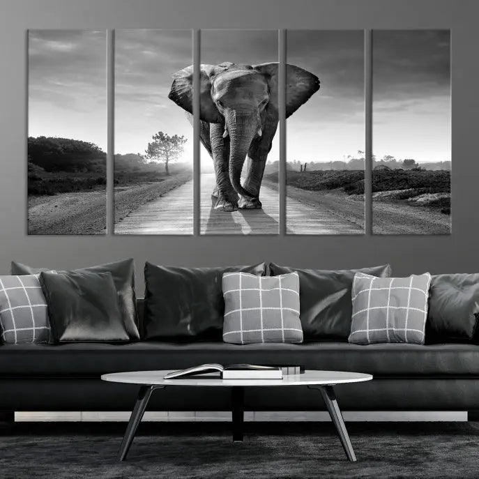 Black and White Elephant Wall Art Canvas Print is displayed as a triptych on museum-quality canvases, elegantly showcased on a dark wall. Each piece is ready to hang and features a durable UV-protective coating.