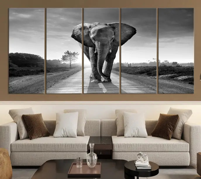 Black and White Elephant Wall Art Canvas Print is displayed as a triptych on museum-quality canvases, elegantly showcased on a dark wall. Each piece is ready to hang and features a durable UV-protective coating.