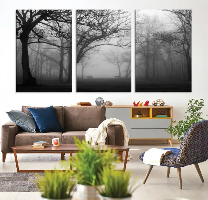 The wall displays the Black and White Foggy Forest Wall Art Canvas Print, carefully gallery wrapped and made from museum-quality pollycotton for an exquisite touch.