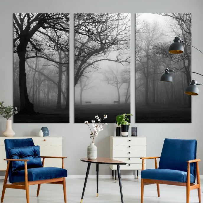 The wall displays the Black and White Foggy Forest Wall Art Canvas Print, carefully gallery wrapped and made from museum-quality pollycotton for an exquisite touch.