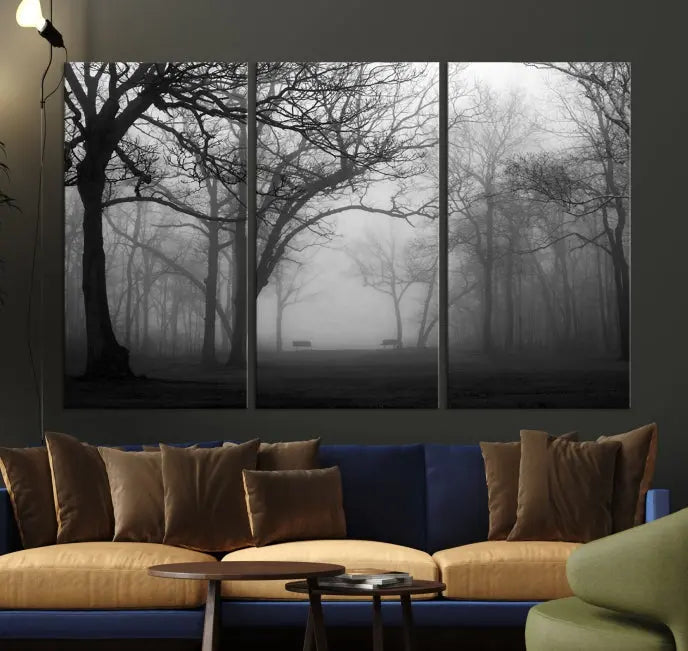 The wall displays the Black and White Foggy Forest Wall Art Canvas Print, carefully gallery wrapped and made from museum-quality pollycotton for an exquisite touch.