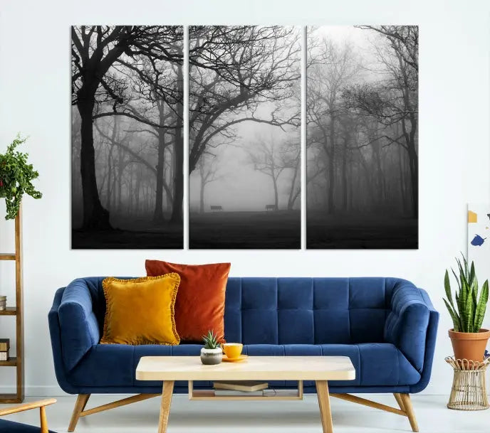 The wall displays the Black and White Foggy Forest Wall Art Canvas Print, carefully gallery wrapped and made from museum-quality pollycotton for an exquisite touch.