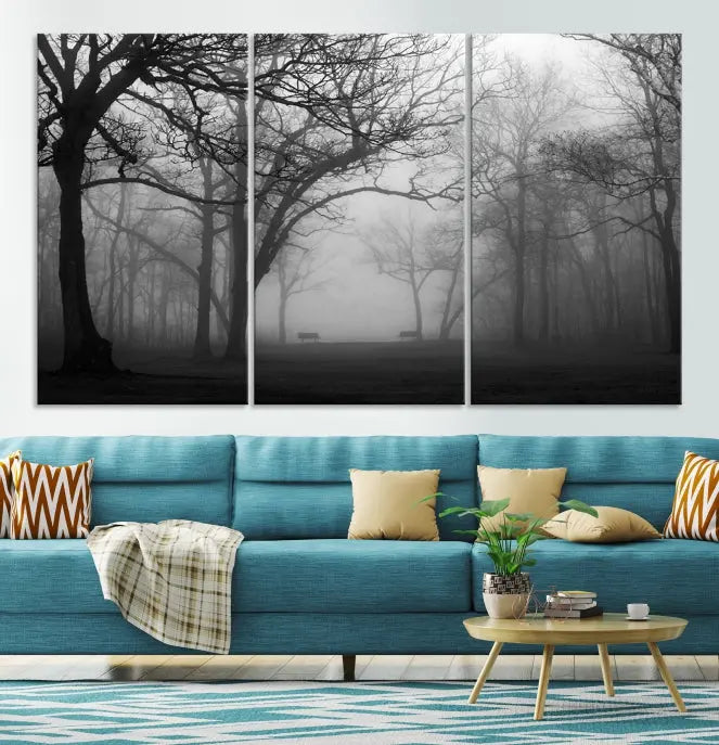 The wall displays the Black and White Foggy Forest Wall Art Canvas Print, carefully gallery wrapped and made from museum-quality pollycotton for an exquisite touch.