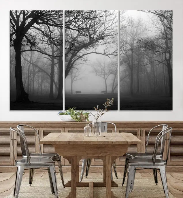 The wall displays the Black and White Foggy Forest Wall Art Canvas Print, carefully gallery wrapped and made from museum-quality pollycotton for an exquisite touch.