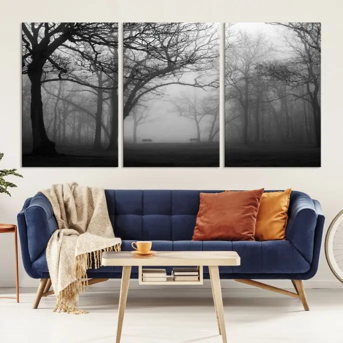 The wall displays the Black and White Foggy Forest Wall Art Canvas Print, carefully gallery wrapped and made from museum-quality pollycotton for an exquisite touch.