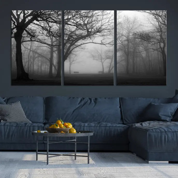 The wall displays the Black and White Foggy Forest Wall Art Canvas Print, carefully gallery wrapped and made from museum-quality pollycotton for an exquisite touch.