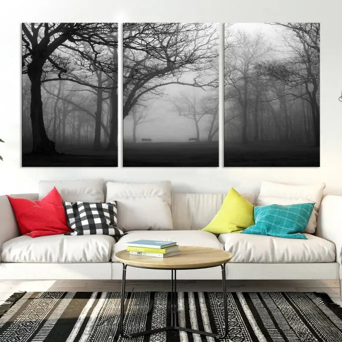 The wall displays the Black and White Foggy Forest Wall Art Canvas Print, carefully gallery wrapped and made from museum-quality pollycotton for an exquisite touch.