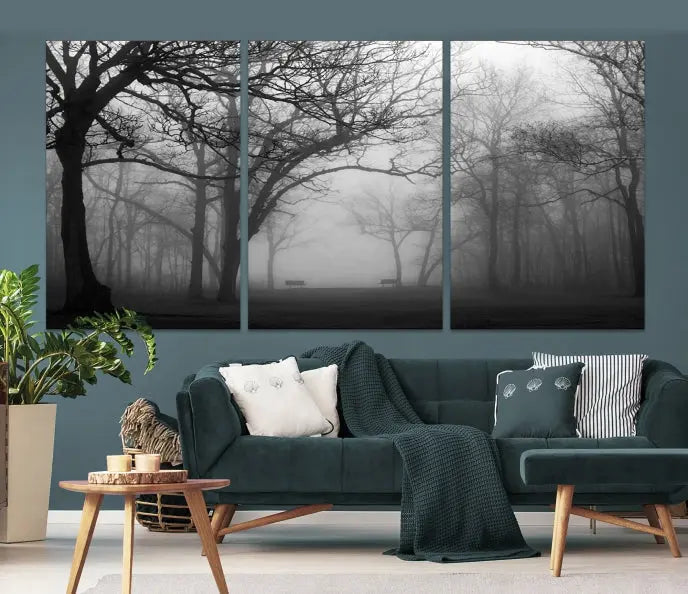 The wall displays the Black and White Foggy Forest Wall Art Canvas Print, carefully gallery wrapped and made from museum-quality pollycotton for an exquisite touch.