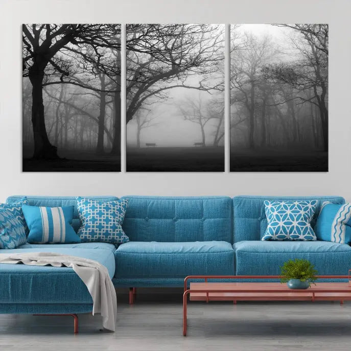 The wall displays the Black and White Foggy Forest Wall Art Canvas Print, carefully gallery wrapped and made from museum-quality pollycotton for an exquisite touch.