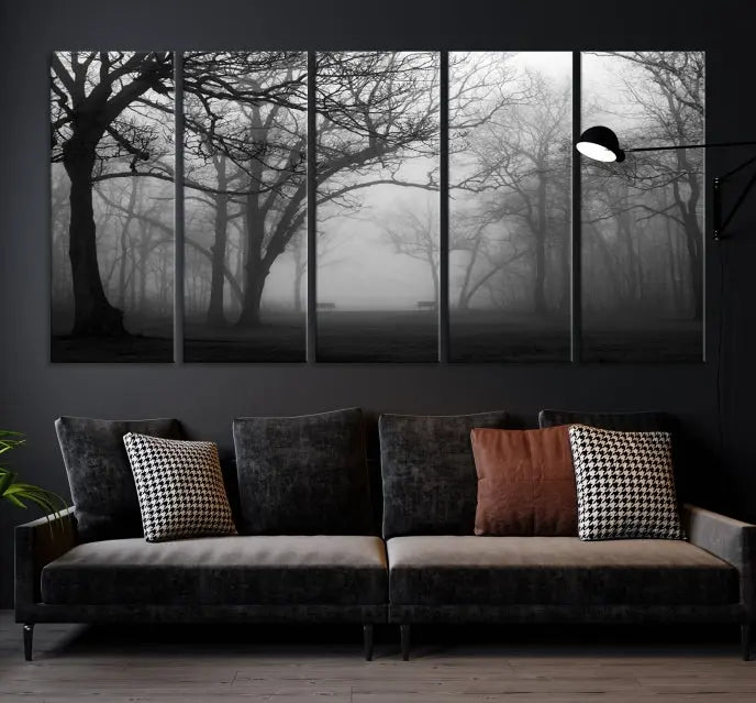 The wall displays the Black and White Foggy Forest Wall Art Canvas Print, carefully gallery wrapped and made from museum-quality pollycotton for an exquisite touch.