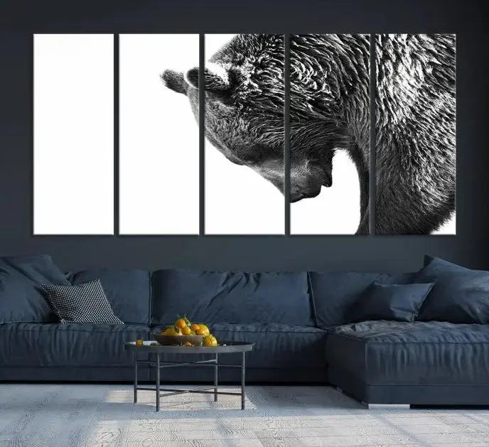 A black and white triptych from the "Black and White Grizzly 399 Bear Canvas Print Wall Art" collection decorates the dark wall.