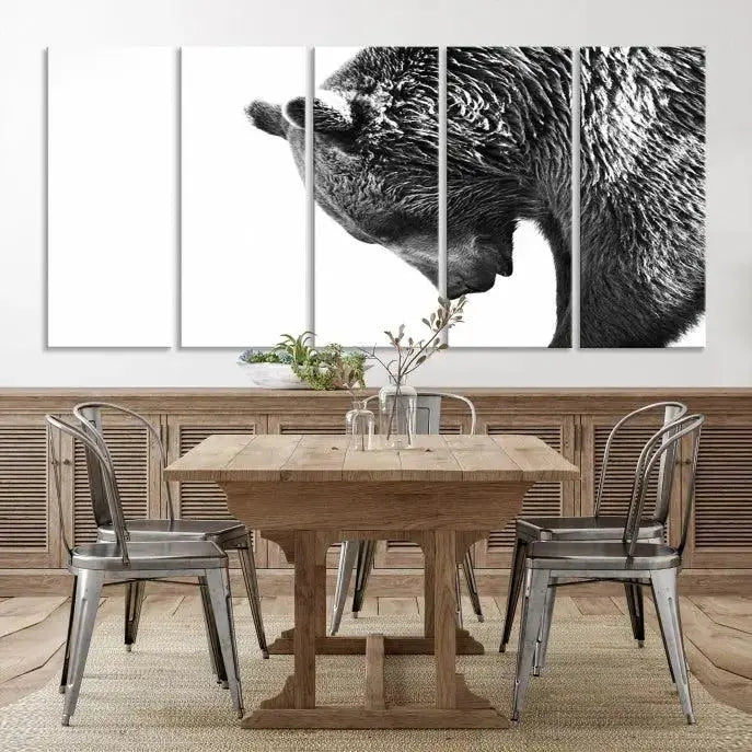 A black and white triptych from the "Black and White Grizzly 399 Bear Canvas Print Wall Art" collection decorates the dark wall.