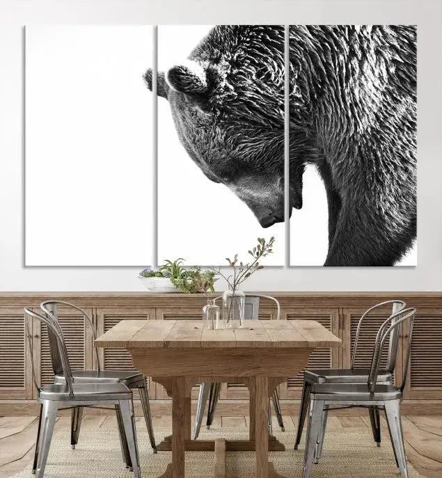 A black and white triptych from the "Black and White Grizzly 399 Bear Canvas Print Wall Art" collection decorates the dark wall.