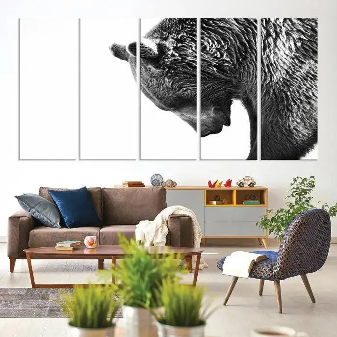 A black and white triptych from the "Black and White Grizzly 399 Bear Canvas Print Wall Art" collection decorates the dark wall.
