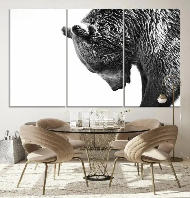 A black and white triptych from the "Black and White Grizzly 399 Bear Canvas Print Wall Art" collection decorates the dark wall.