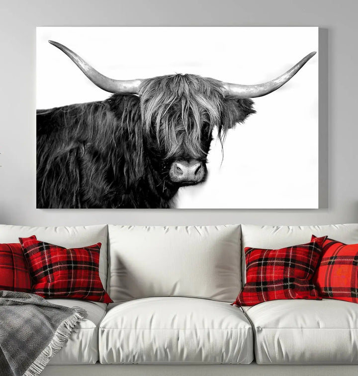 A Black and White Highland Cow Multi Panel Wall Art Canvas Print with UV-protective coating is displayed.