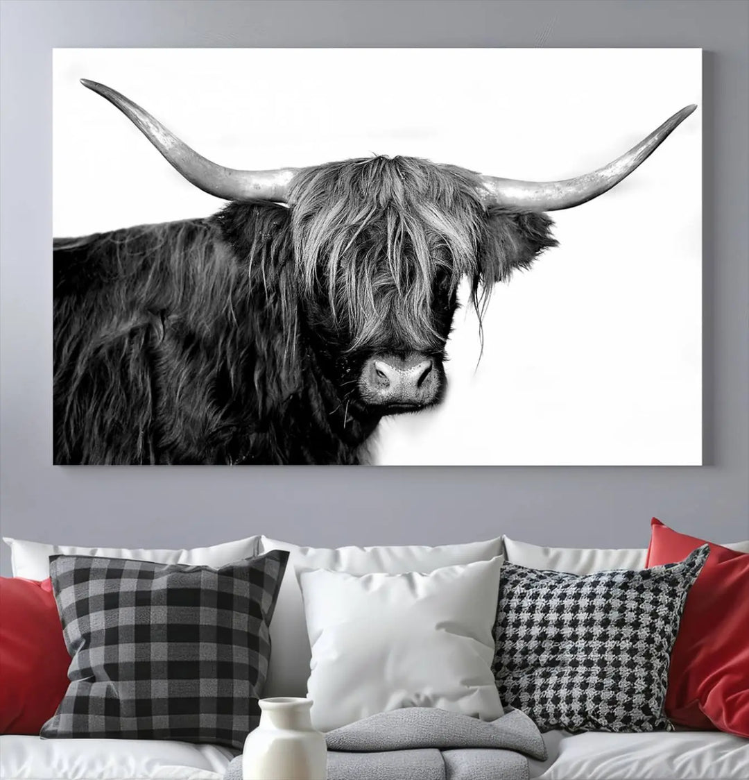 A Black and White Highland Cow Multi Panel Wall Art Canvas Print with UV-protective coating is displayed.