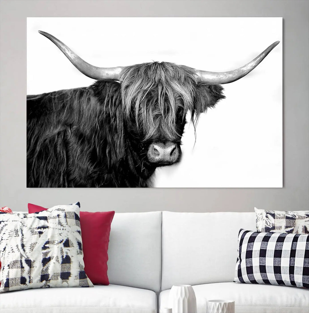 A Black and White Highland Cow Multi Panel Wall Art Canvas Print with UV-protective coating is displayed.