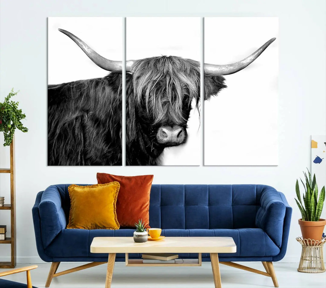 A Black and White Highland Cow Multi Panel Wall Art Canvas Print with UV-protective coating is displayed.