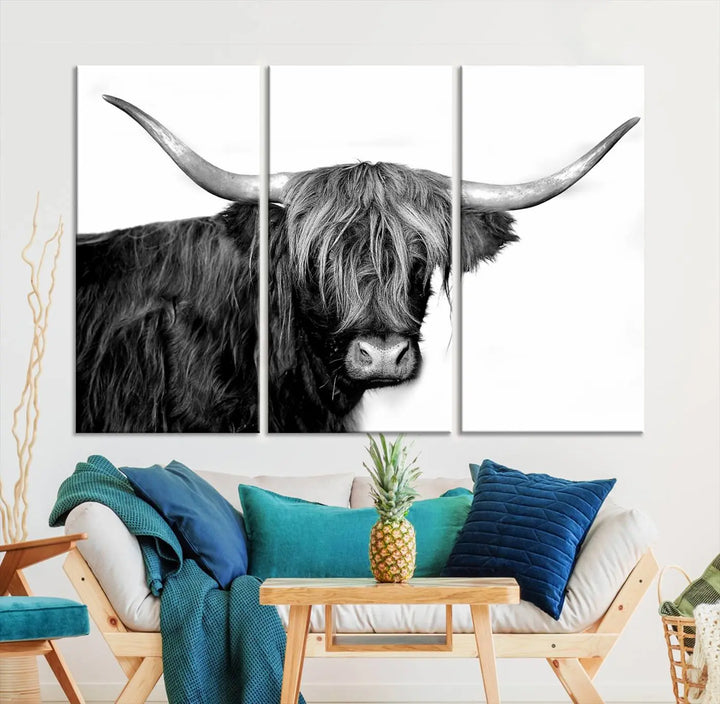 A Black and White Highland Cow Multi Panel Wall Art Canvas Print with UV-protective coating is displayed.