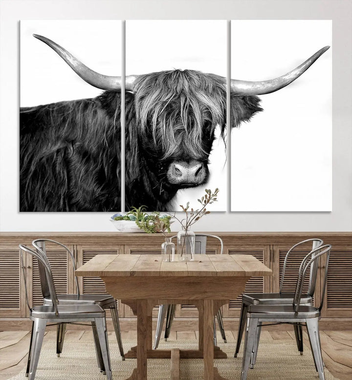 A Black and White Highland Cow Multi Panel Wall Art Canvas Print with UV-protective coating is displayed.