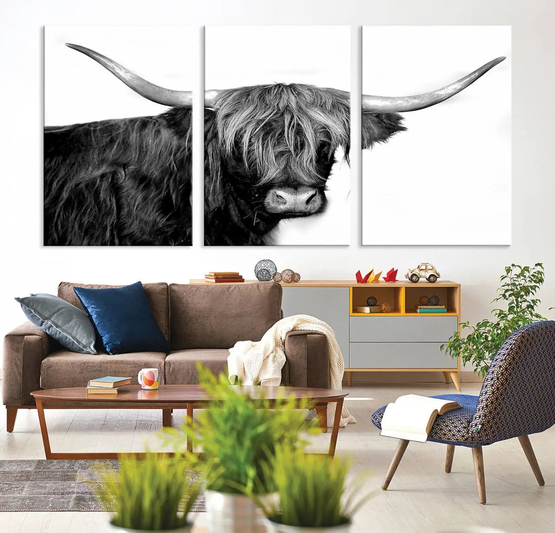 A Black and White Highland Cow Multi Panel Wall Art Canvas Print with UV-protective coating is displayed.