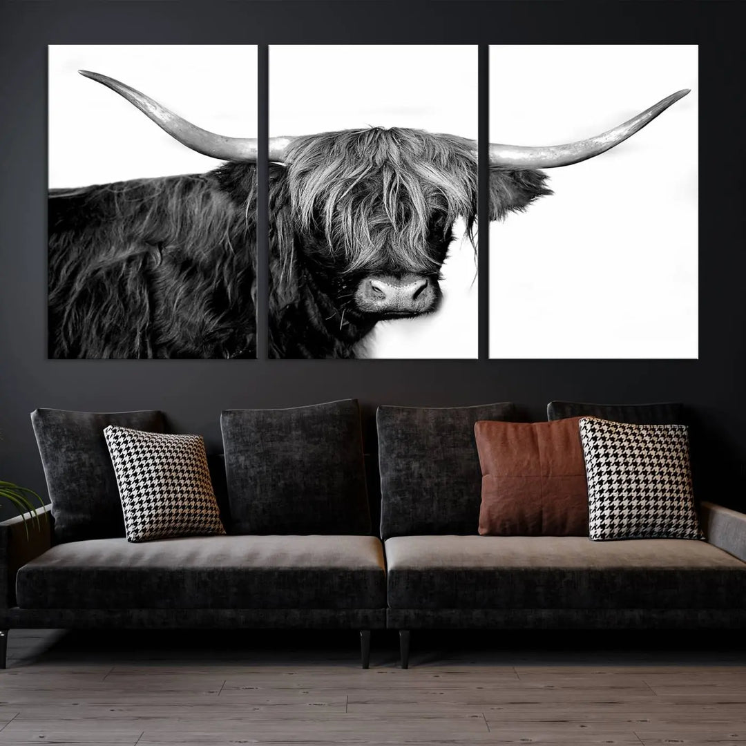 A Black and White Highland Cow Multi Panel Wall Art Canvas Print with UV-protective coating is displayed.