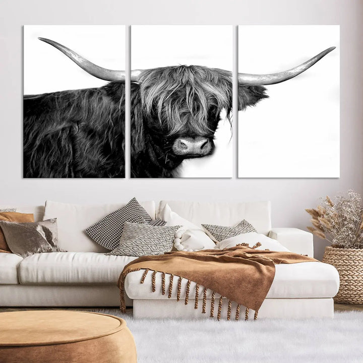 A Black and White Highland Cow Multi Panel Wall Art Canvas Print with UV-protective coating is displayed.