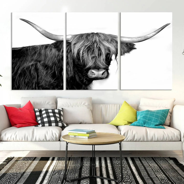 A Black and White Highland Cow Multi Panel Wall Art Canvas Print with UV-protective coating is displayed.